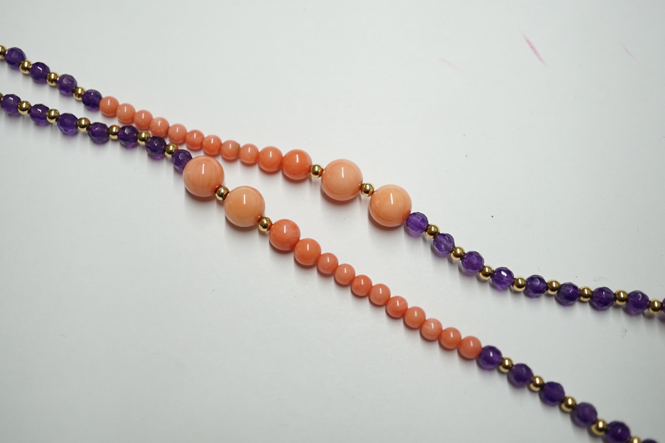 A 9ct amethyst and coral long necklace, 124cm. Condition - fair